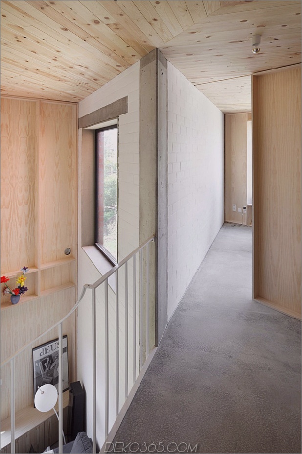 Belgien-Winkel-Haus-mit-Beton-Holz-und-Ziegel-Interieur-8.jpg