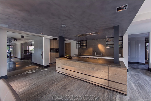 custom-details-create-visual-feast-minimalist-home-4-kitchen-facade.jpg