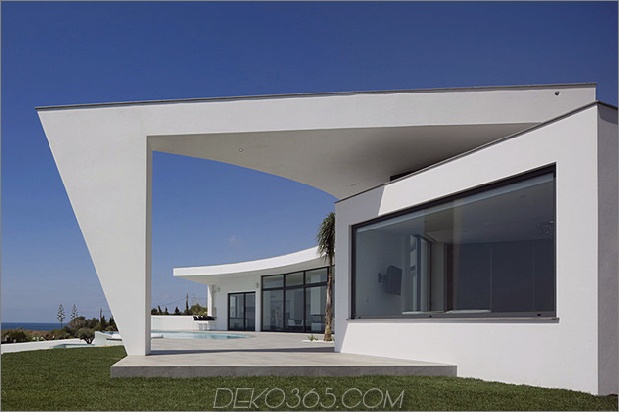 Bogenhaus-mit-Luxus-Interieur-und-kantig gekrümmten Dach-5.jpg