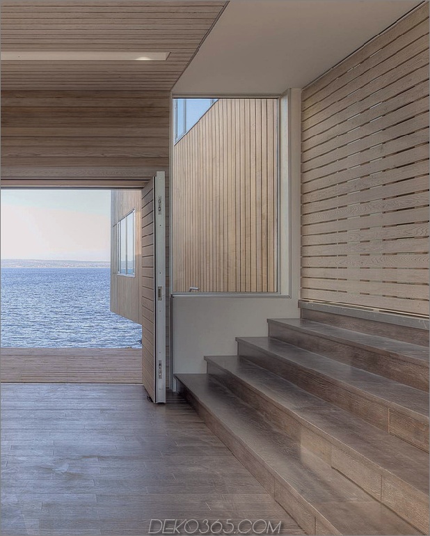 Boot-inspiriertes Holzhaus-hängen über dem Ozean-11.jpg