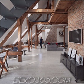 Büro-Dachboden umgewandelt in Loft-Wohnung, die ursprüngliches Holz und Ziegelstein hält