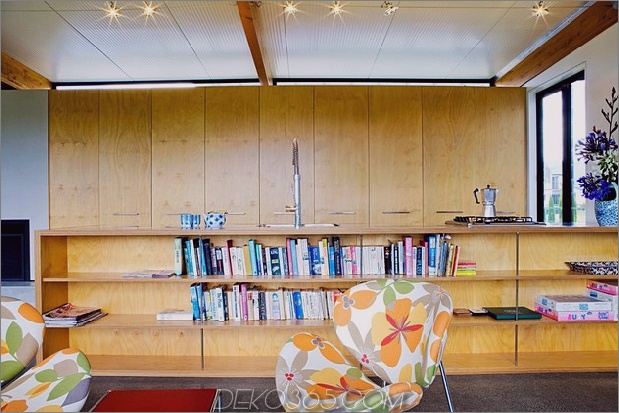 modern-suburban-lake-house-design-private-beachside-living-7-chairs.jpg