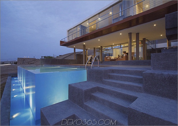geometrisches Strandhaus-mit-schwimmendem-glasiert-Obergeschoss-3.jpg