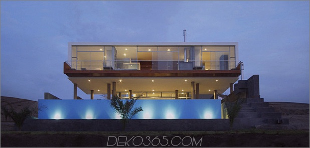geometrisches Strandhaus-mit-schwimmendem-glasiert-Obergeschoss-16.jpg