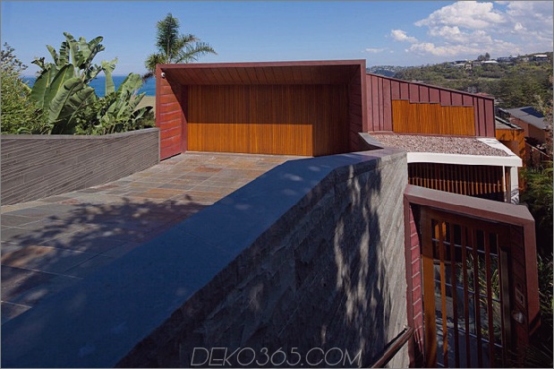 Resort-Haus-mit abgewinkelten Terrassen aus Holz und Glas-3.jpg