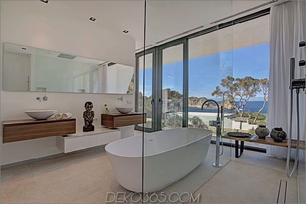 chic-house-with-curving-two-story-patio-22-master-bathroom.jpg